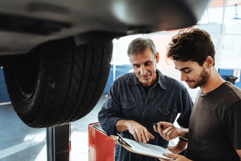 customer speaking to a mechanic