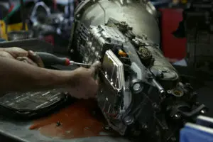 Technician working on a transmission