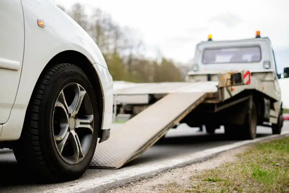 car being towed to nearest auto repair shop