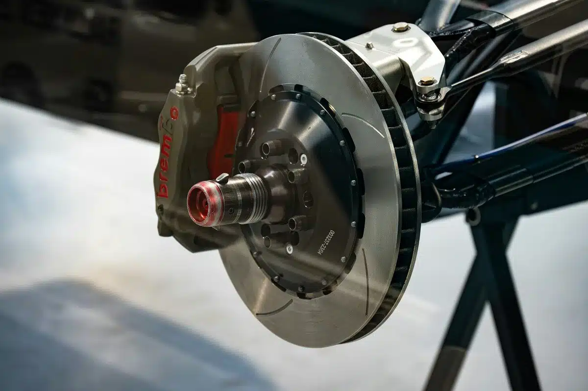brake caliper being repaired at auto repair shop