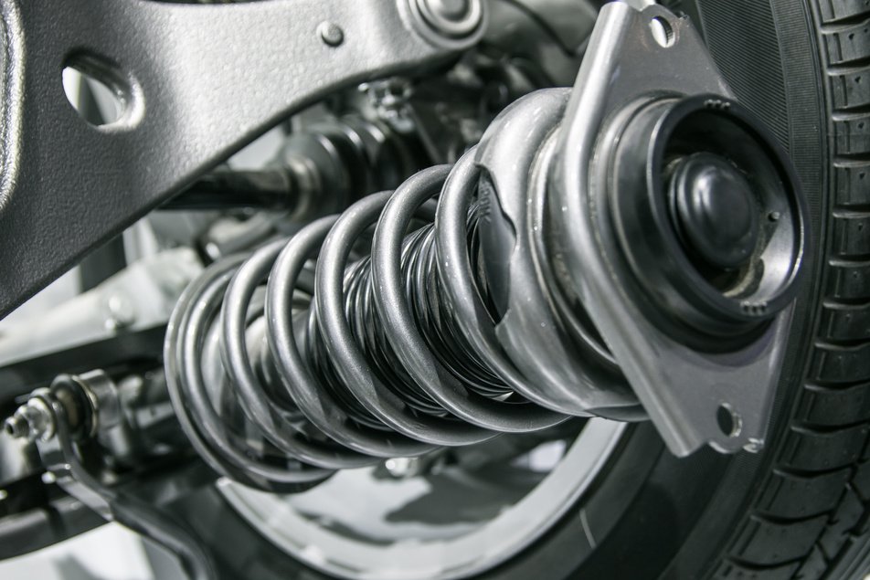shocks in vehicle suspension assembly
