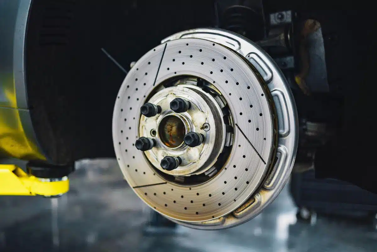 vehicle undergoing brake rotor replacement