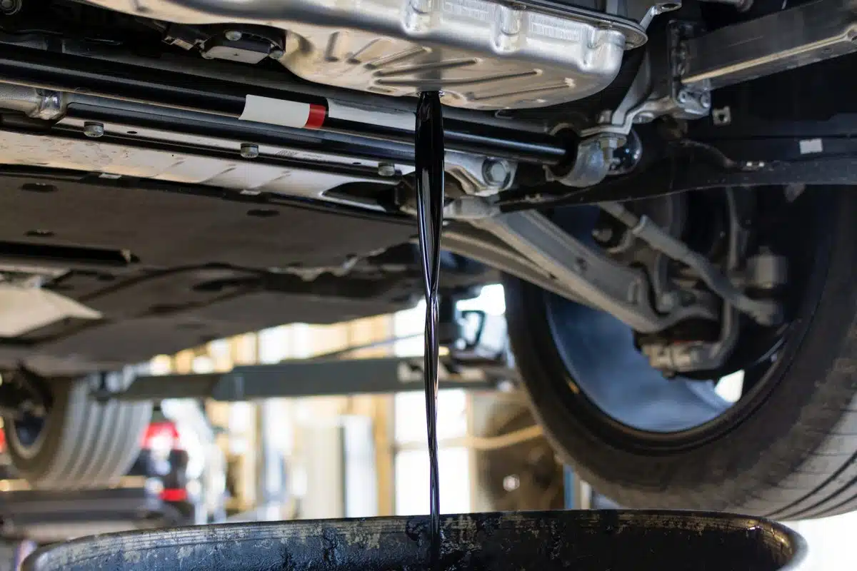 oil being drained from car