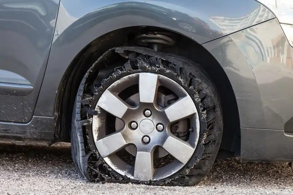 blown out damaged tire on vehicle